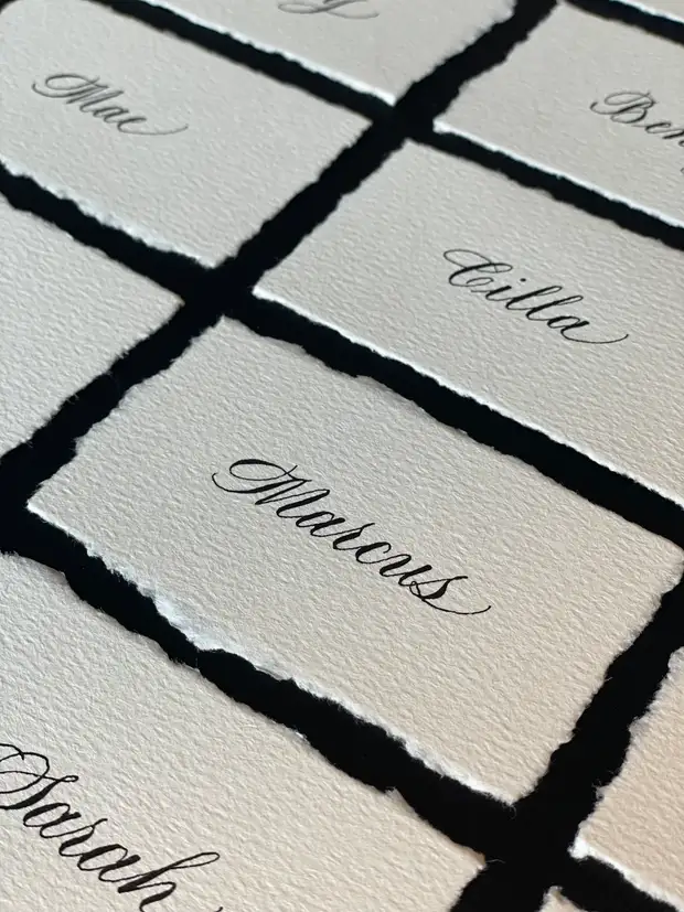 Deckle edge wedding place card calligraphy