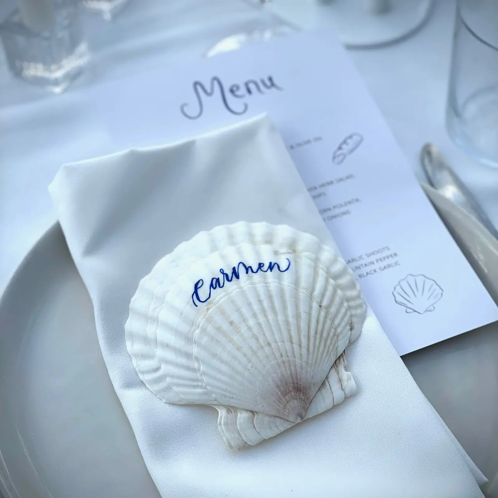 Shell wedding place card calligraphy detail