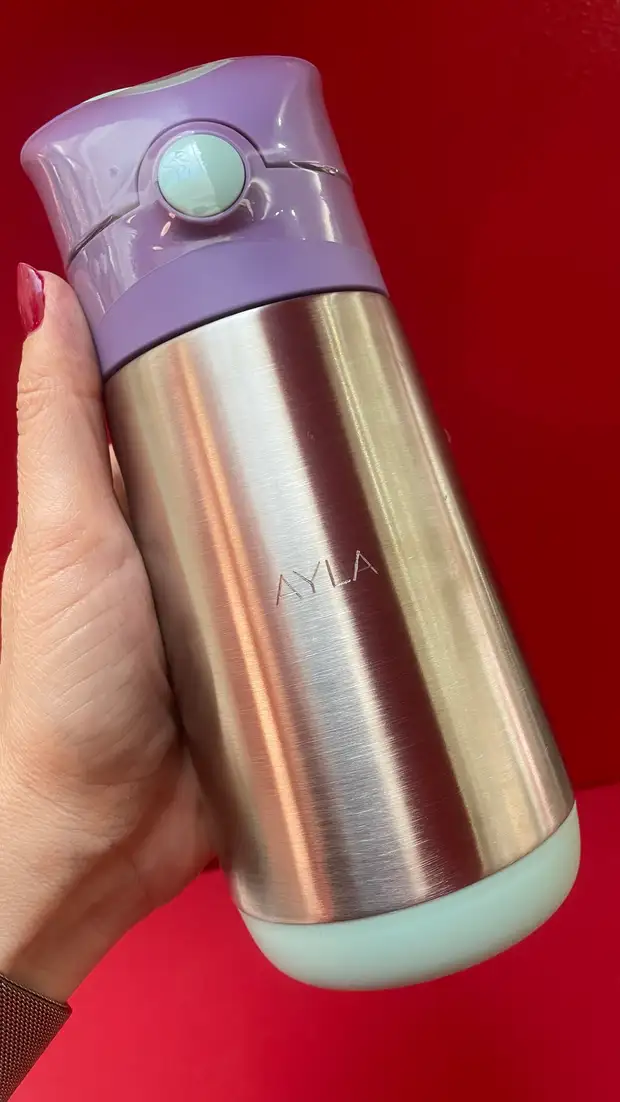 Sans serif name engraving on a stainless steel water bottle