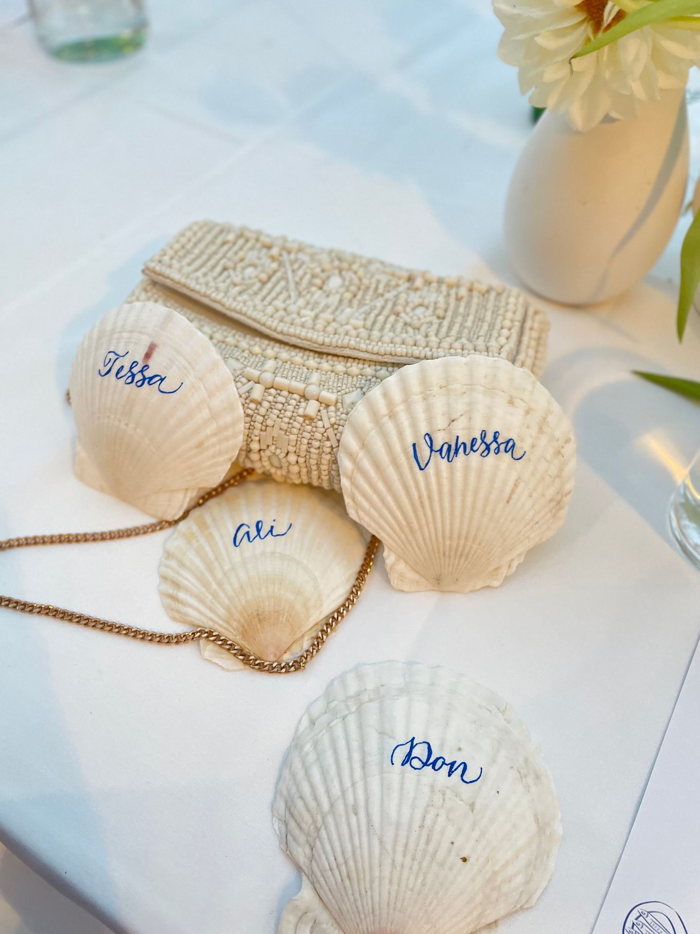 Shell place card calligraphy