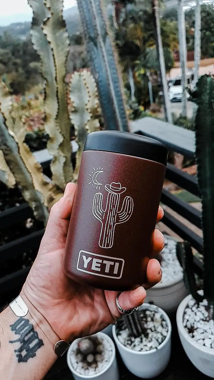 Hand-drawn cactus artwork engraved on a Yeti can cooler